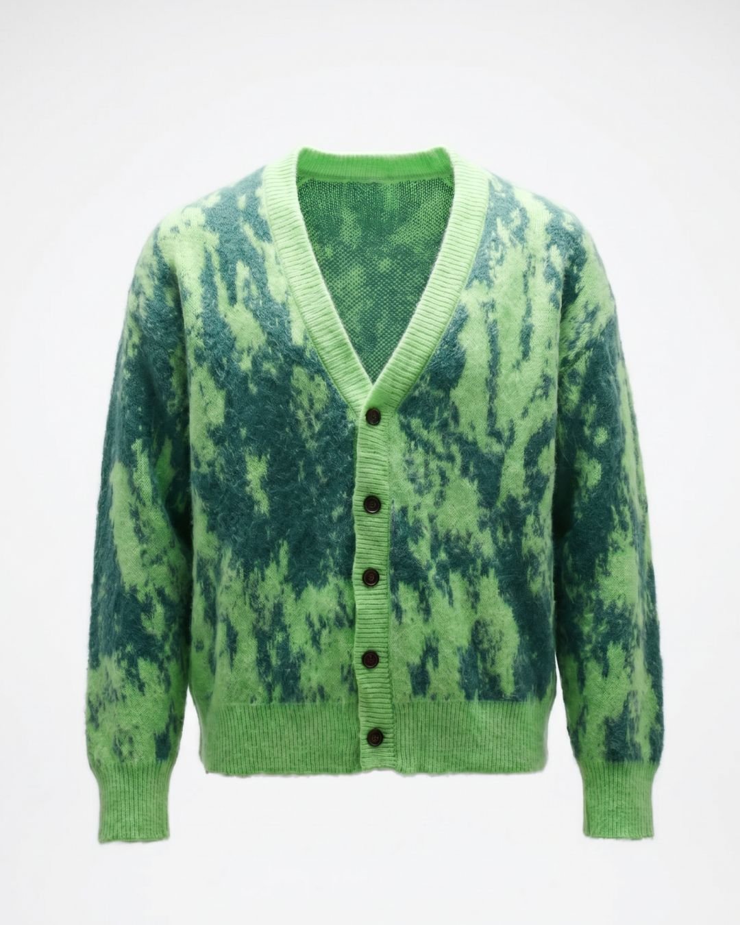 Product shot of mohair Grass cardigan with sleek black buttons and green abstract pattern.