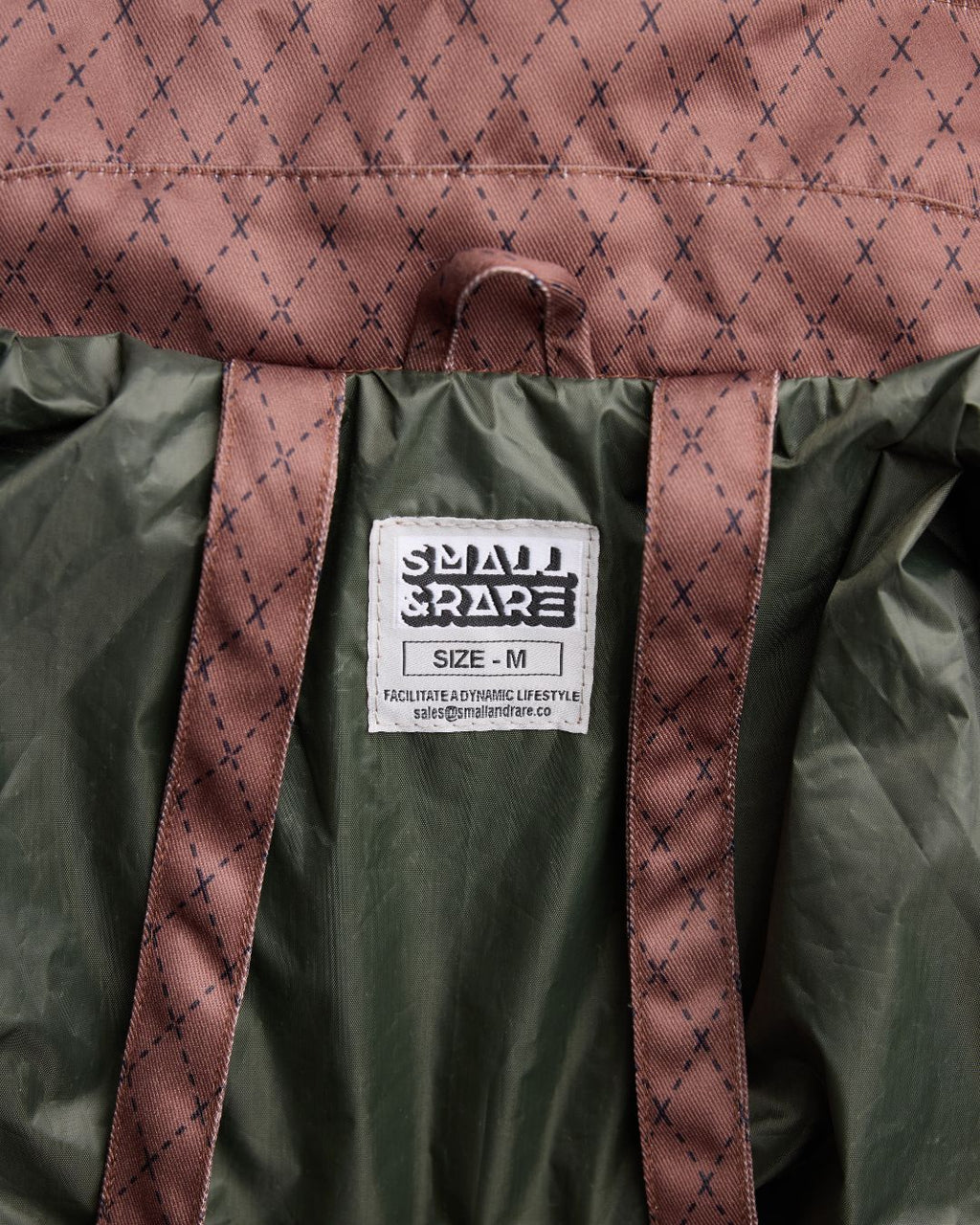 Close-up of the Versa Workwear Jacket’s durable cotton canvas fabric showing subtle weave texture and reinforced shoulder