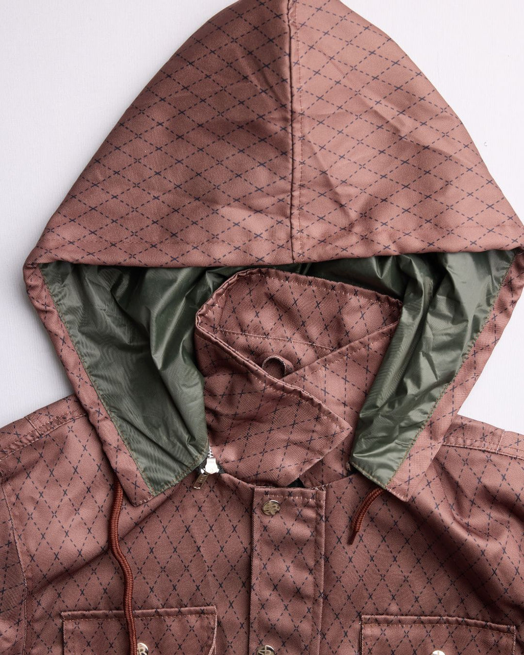 Close-up of the Versa Workwear Jacket’s navy stretch fabric, showcasing the durable material and neat stitching at the