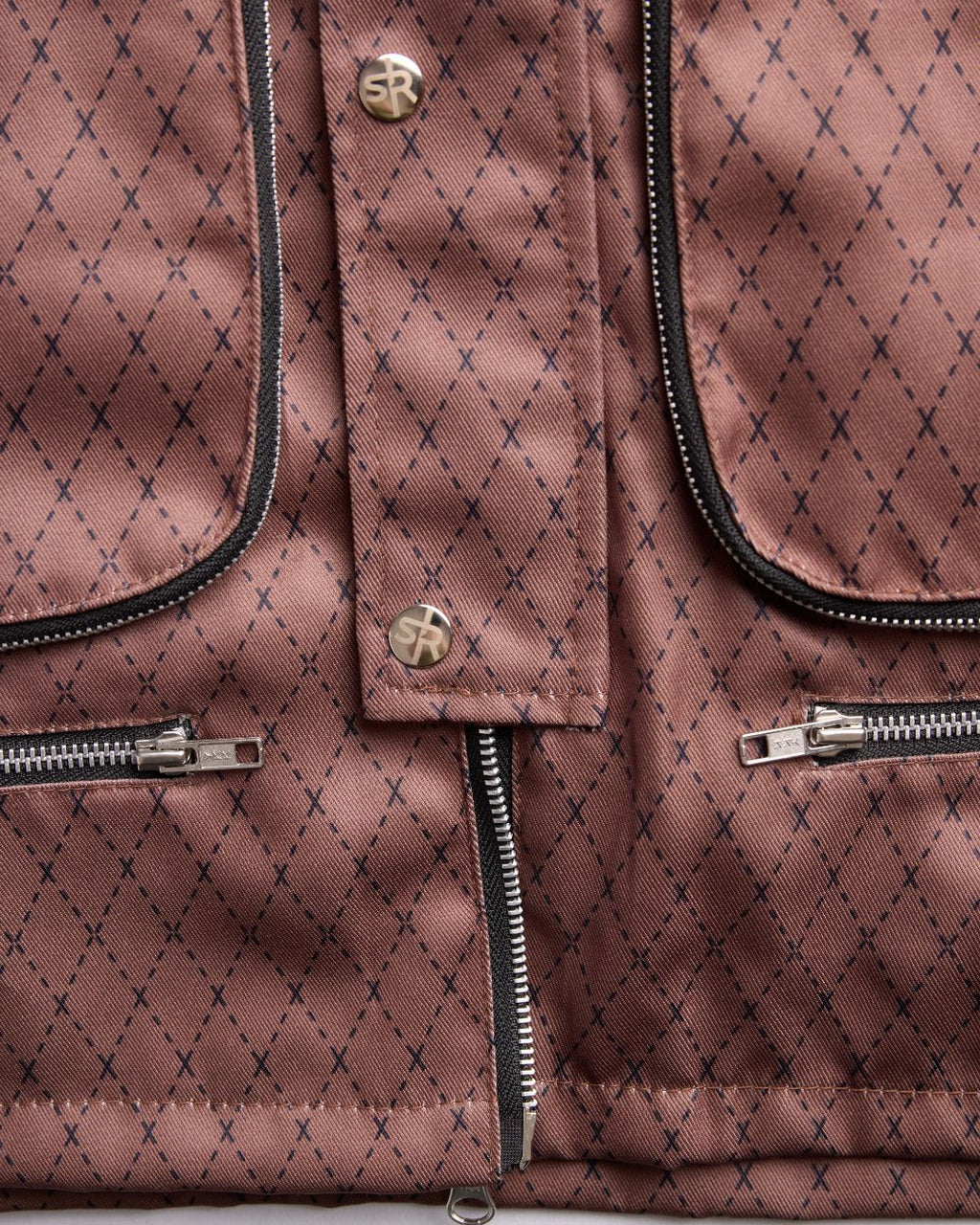 Close-up of the Versa Workwear Jacket’s reinforced cuff with stitched detail in olive green cotton blend fabric