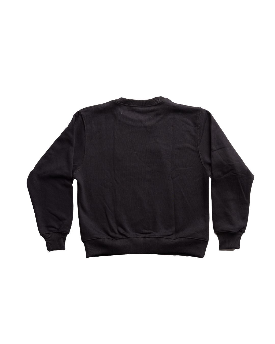 Close-up of the black crewneck's textured cotton fabric and subtle ribbed neckline detail from a front angle.