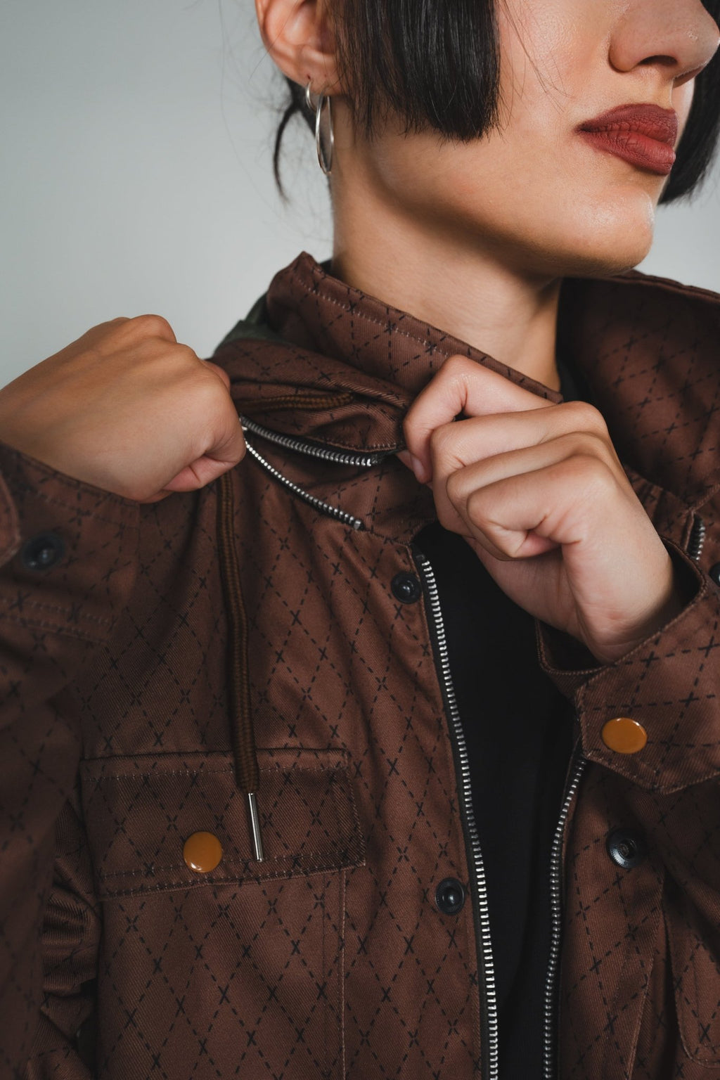 Close-up of navy Versa Workwear Jacket’s reinforced elbow patch and textured cotton blend fabric for durability and comfort