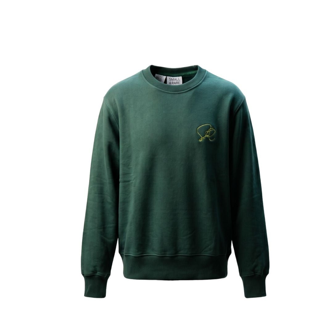Green core lon gsleeve sweatshirt with a small logo on a white background